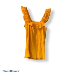 H&M yellow top with flower detail around n…